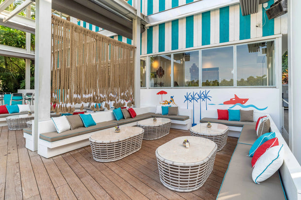 Playful and modern restaurant design with a bold, colorful palette and eco-conscious furnishings by Theodora Martinou from Irregular Lines.