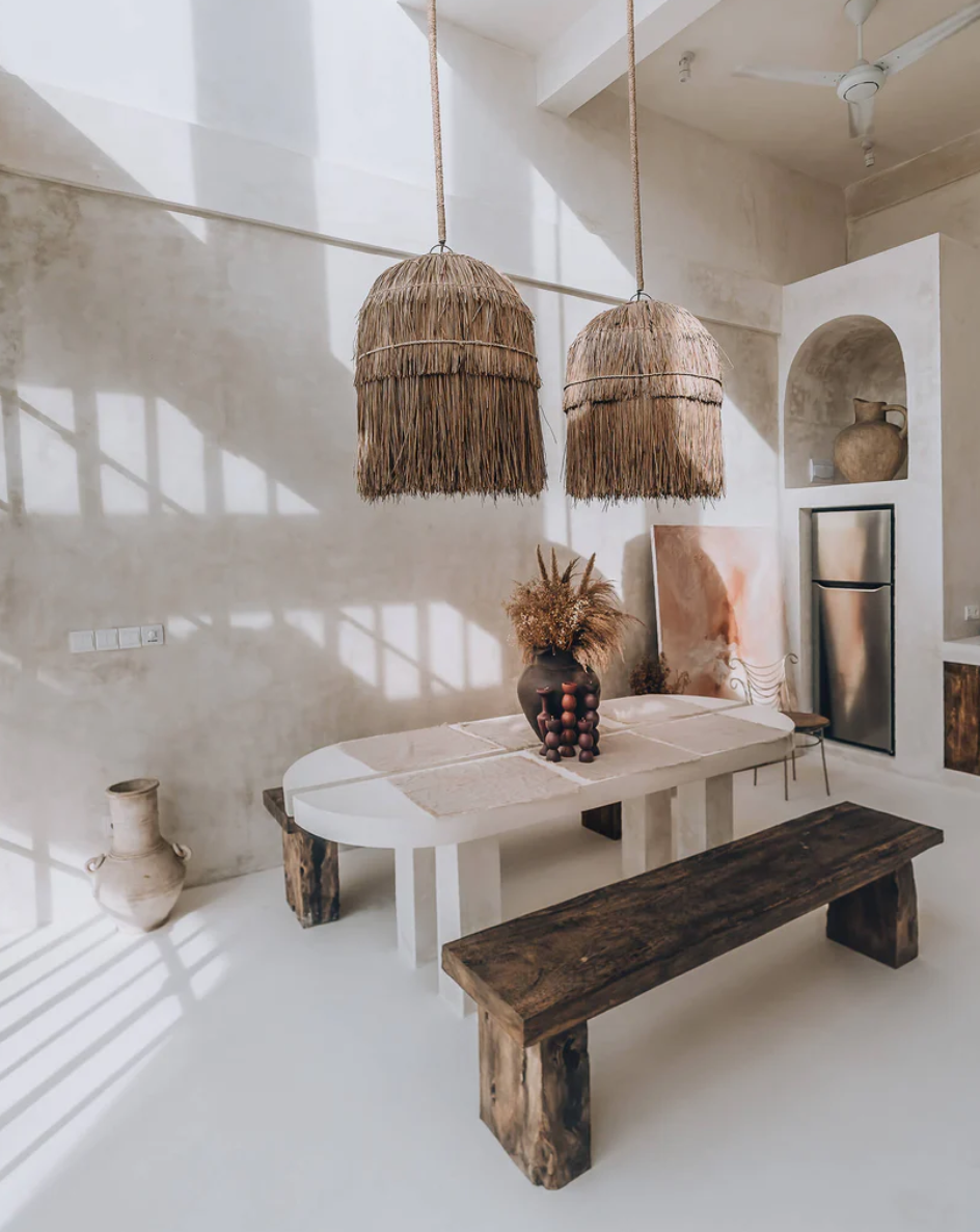 Woven rattan pendant lights adding natural texture to a contemporary interior.